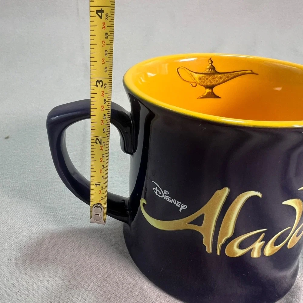 Disney Aladdin Broadway Musical‎ Coffee Mug Purple Yellow Genie Lamp Inside